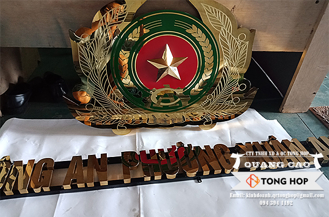 logo bộ công an inox vàng ăn mòn